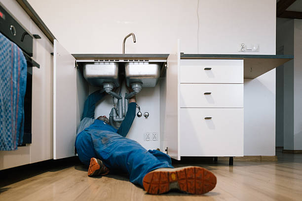 Professional Drain Cleaning technician working in Hobe Sound, FL
